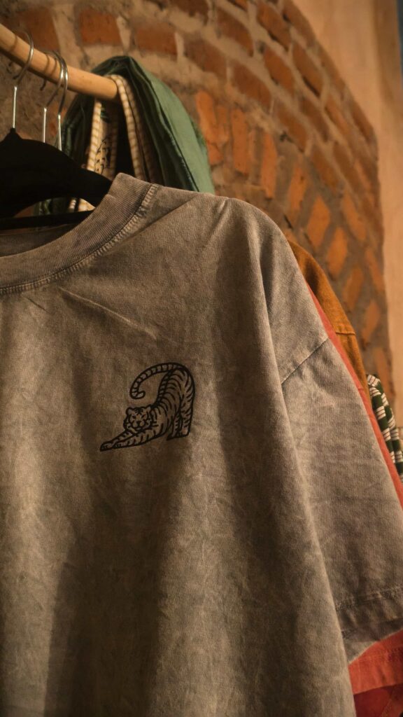 Grey Yoga 108 Bali T-shirt Hanging in Studio Good Karma Shop 