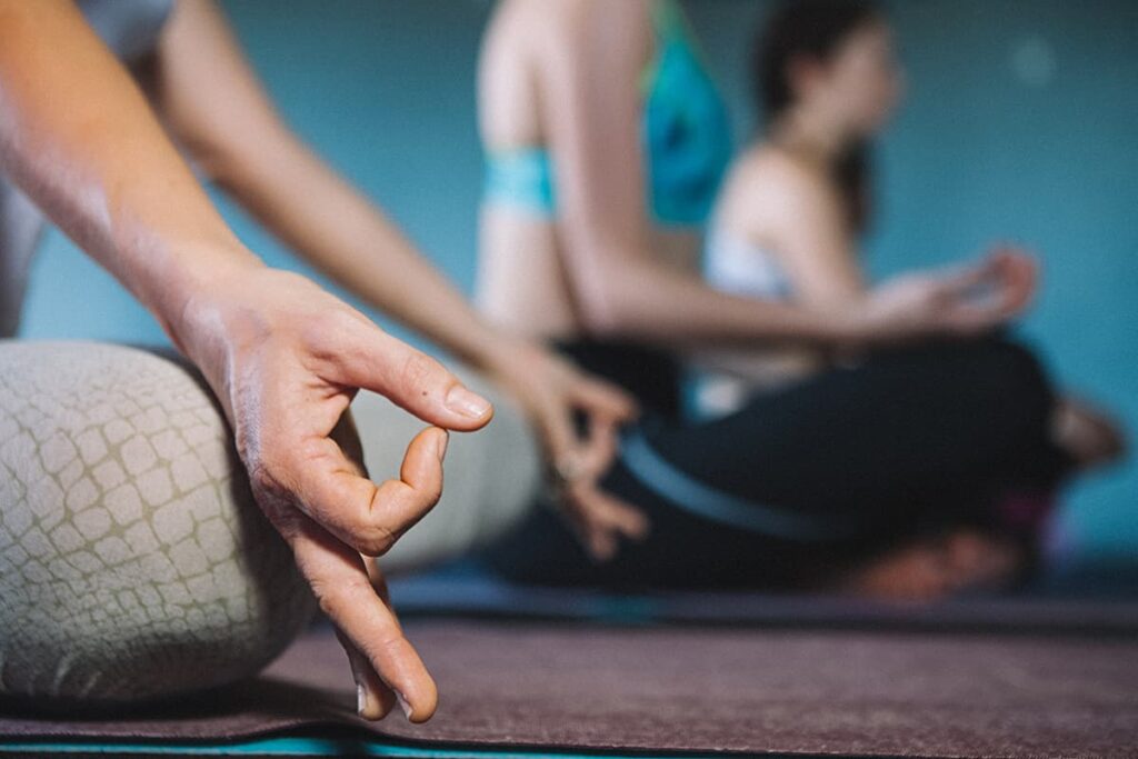 Yoga Students meditation seated mudra pose