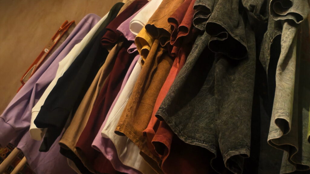 T-shirts Display of Yoga 108 Clothing in the Good Karma Shop